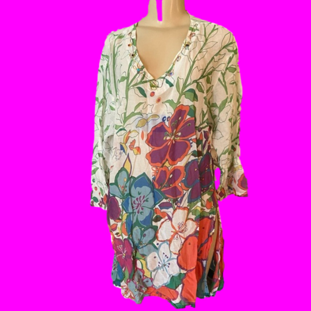 UNMI cover up for beach or poolside socializing. Sheer floral with side slits.